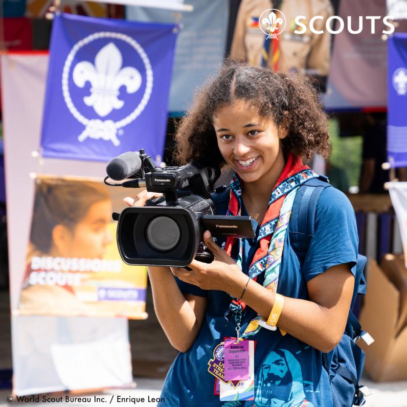 Scout with camera during Jamboree