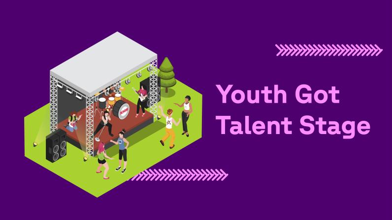 A stage with a rockband playing and people dancing in front of it represents the Youth Got Talent Stage